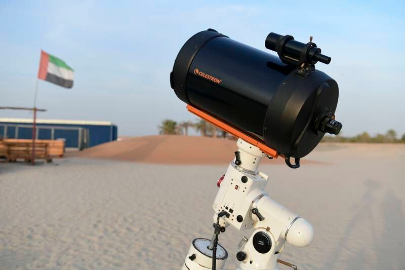 A telescope set up for visitors to learn about space activity 