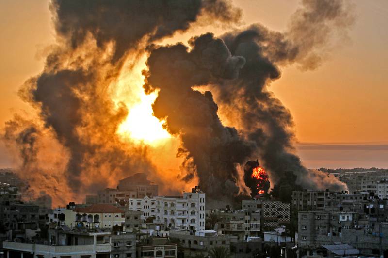 A fire rages in the Gaza Strip following an Israeli airstrike on May 12. AFP