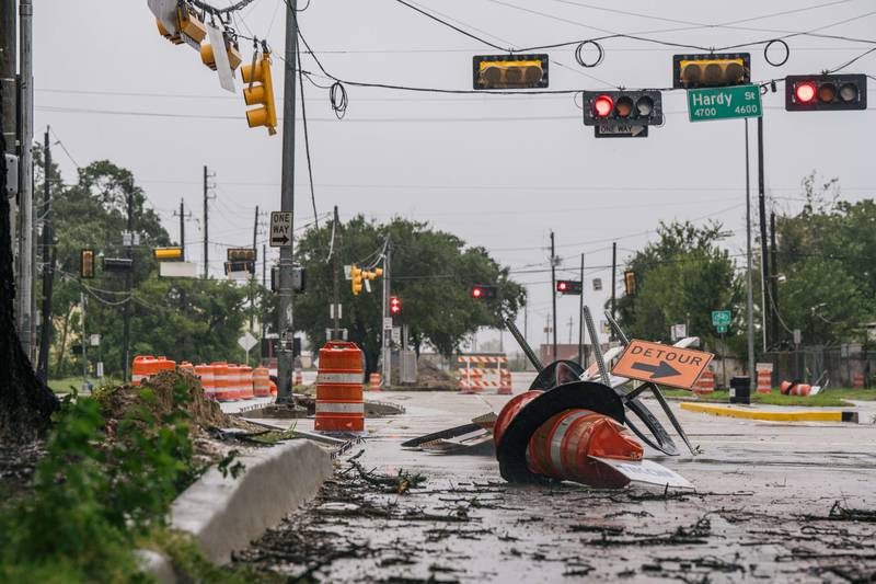Tropical Storm Nicholas leaves roads damaged and flooded in Houston, Texas. AFP