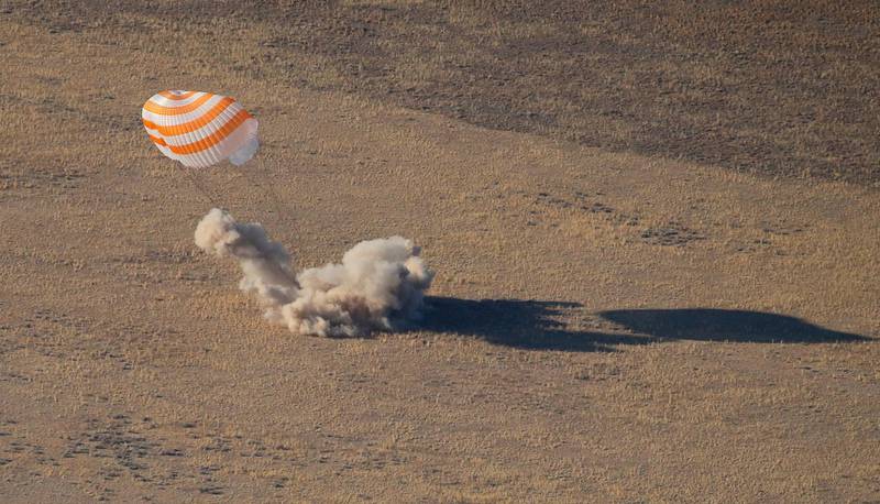 The Russian Soyuz MS-12 space capsule lands about 150km south-east of the Kazakh town of Zhezkazgan. AP Photo