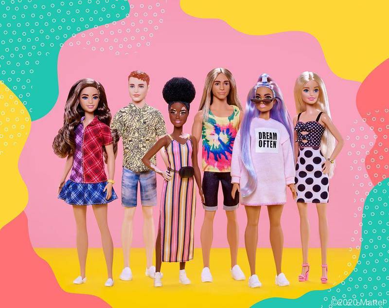 The newest additions to Barbie's Fashionista ine include a doll with alopecia, centre, and a redheaded Ken. Instagram / Barbie