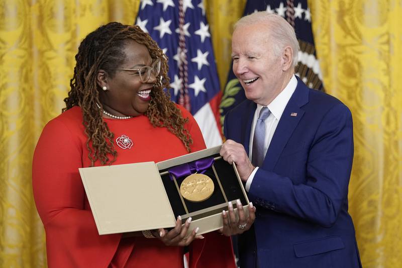 Mr Biden presents the 2021 National Medal of the Arts to Blondel Pinnock on behalf of the Billie Holiday Theatre. AP