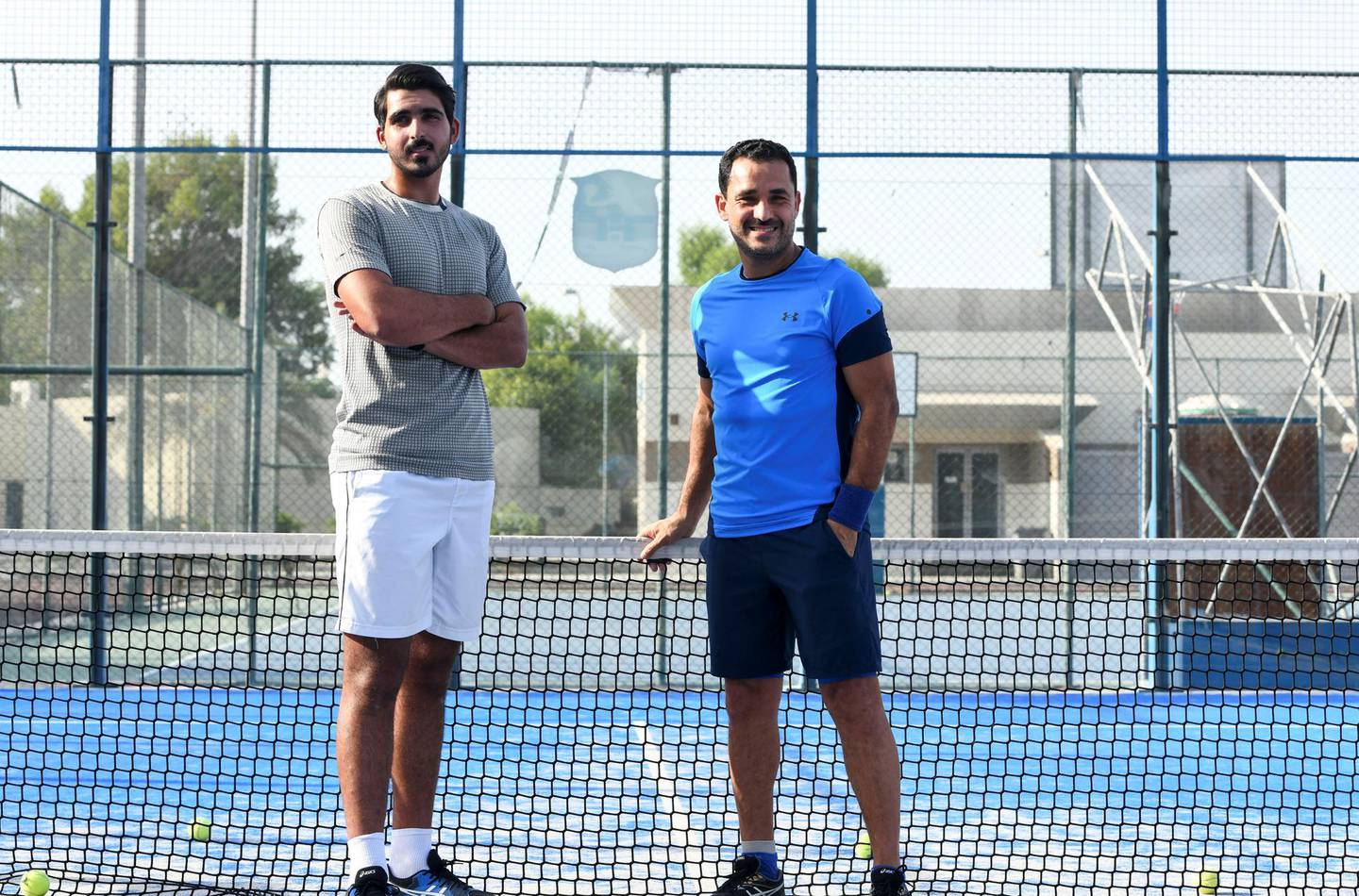 Nasser Al Ketbi-AD Nasser Al Ketbi, 23, with his guardian and mentor Hand Esaad, 50 at the Abu Dhabi Country Club on May 24, 2021. Khushnum Bhandari / The National 
Reporter: Haneen Dajani News