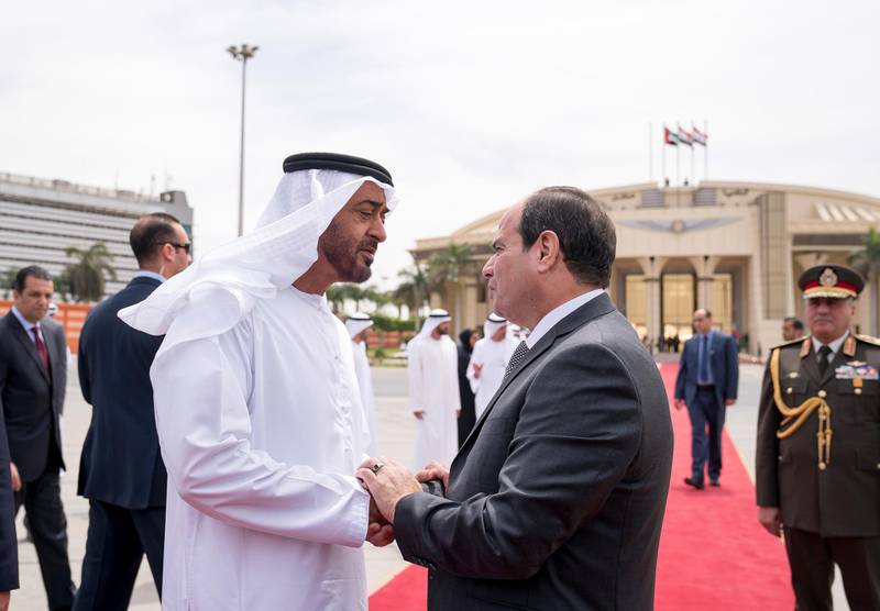 CAIRO, EGYPT - April 11, 2018: HH Sheikh Mohamed bin Zayed Al Nahyan Crown Prince of Abu Dhabi Deputy Supreme Commander of the UAE Armed Forces (L), bids farewell to HE Abdel Fattah El Sisi, President of Egypt (R), concluding an official visit.

( Mohammed Al Hammadi / Crown Prince Court - Abu Dhabi )
---