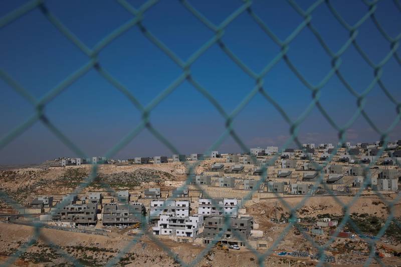 This Tuesday, Jan. 1, 2019 photo, shows a new housing project in the West Bank settlement of Naale. Data obtained by The Associated Press shows that the Israeli government -- with little resistance from a friendly White House -- has gone on a settlement push in the West Bank since President Donald Trump took office. That has laid the groundwork for what could be the largest binge in construction in years. (AP Photo/Ariel Schalit)