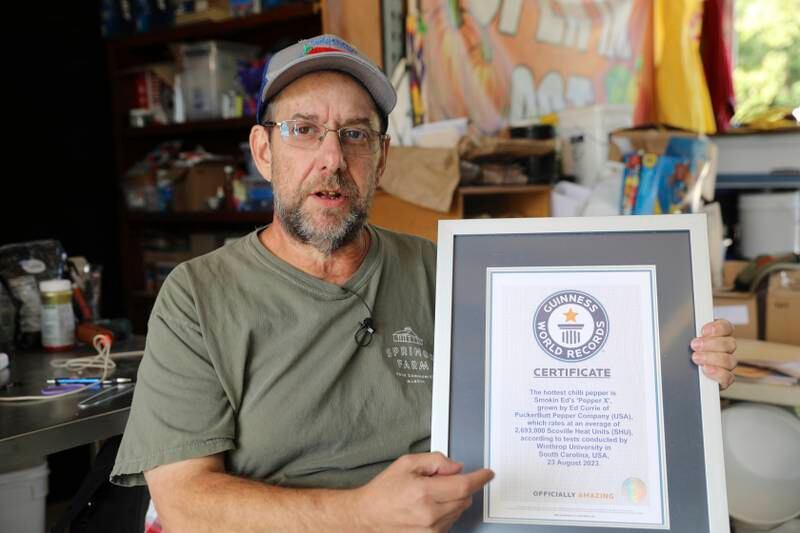 Ed Currie with his Guinness Book of World Records certification. AP