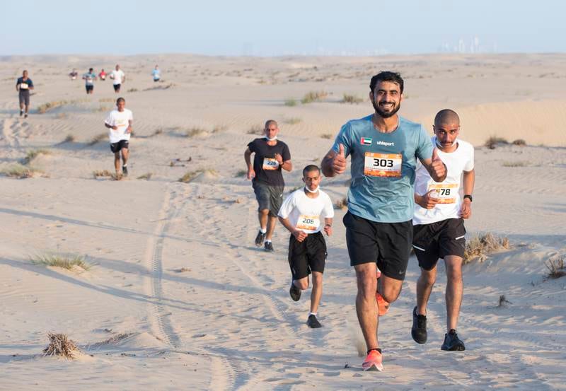 People took part in the 50km desert ultra-race or the 5km dune run.
