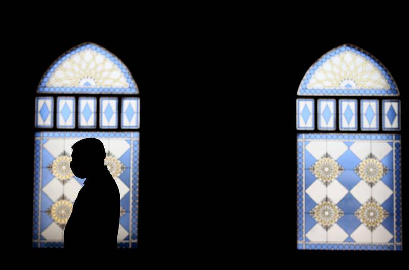 DUBAI, UNITED ARAB EMIRATES - APRIL 14: A Muslim man prays at Al Farooq Omar Bin Al Khattab Mosque on April 14, 2021 in Dubai, United Arab Emirates. Muslim men and women across the world observe Ramadan, a month long celebration of self-purification and restraint. During Ramadan, the Muslim community fast, abstaining from food, drink, smoking and sex between sunrise and sunset, breaking their fast with an Iftar meal after sunset.  (Photo by Francois Nel/Getty Images)