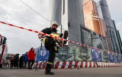 An emergency cordon set up around a building in Moscow damaged by a drone attack on August 23. EPA