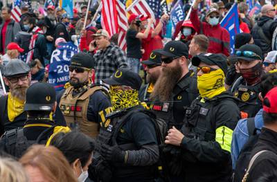 Members of the Proud Boys storming the US Capitol on January 6. AFP
