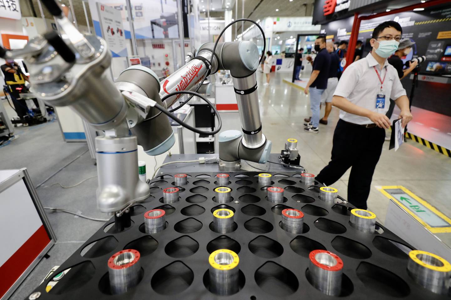 Robotic arms in action during the intelligent Asia show in Taipei. EPA