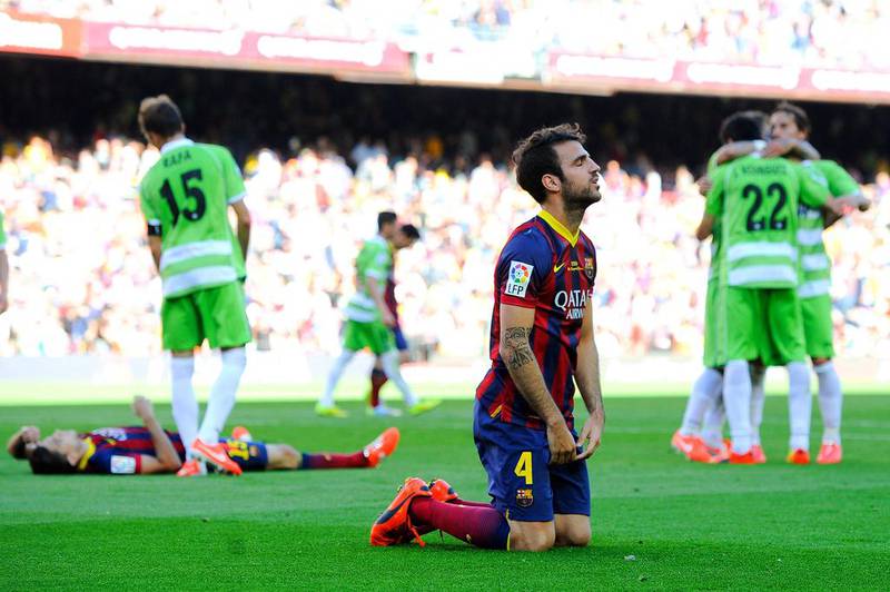 Cesc Fabregas and his Barcelona teammates react after allowing Lafita's second goal to allow Getafe to earn a draw Camp Nou on May 3, 2014 in Barcelona, Spain, denting Barca's title chances. David Ramos / Getty Images