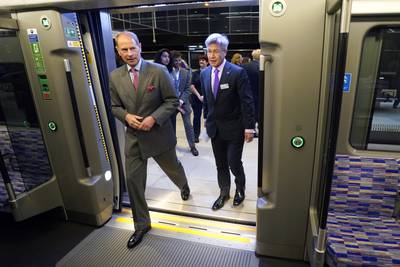 Prince Edward and Howard Smith, chief operating officer of Elizabeth Line, board one of the line's trains. PA