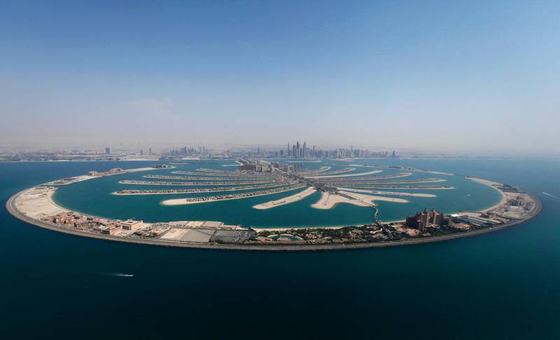 An aerial view of The Palm Jumeirah is seen in Dubai, August 31, 2012. Wealthy Afghans have sharply increased the pace of investment in property in the Gulf Emirate, motivated by a mix of hard-headed commercial calculations and more nebulous security fears sparked by the drawdown. To match INSIGHT AFGHANISTAN-DUBAI/  Picture taken August 31, 2012. REUTERS/Jumana ElHeloueh (UNITED ARAB EMIRATES - Tags: REAL ESTATE BUSINESS) - RTR37WG6