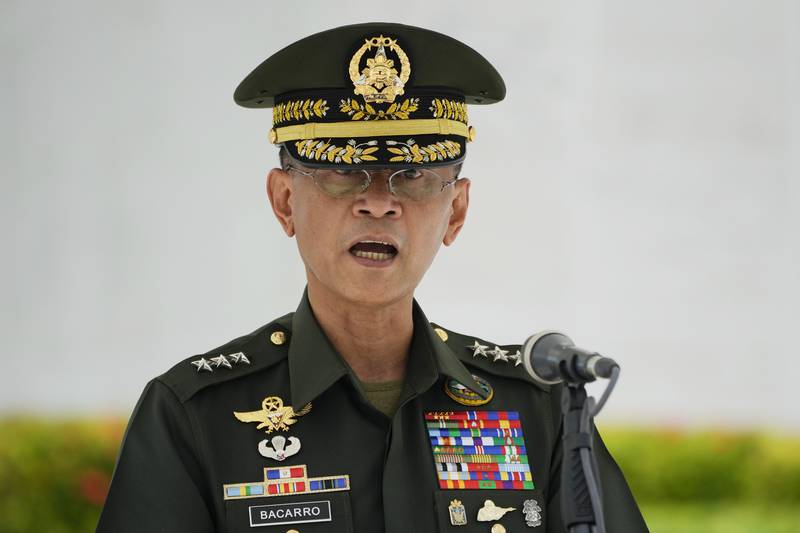 Lt Gen Bartolome Bacarro, decorated for bravery as a young officer, has been replaced by a general who was months from retirement. AP