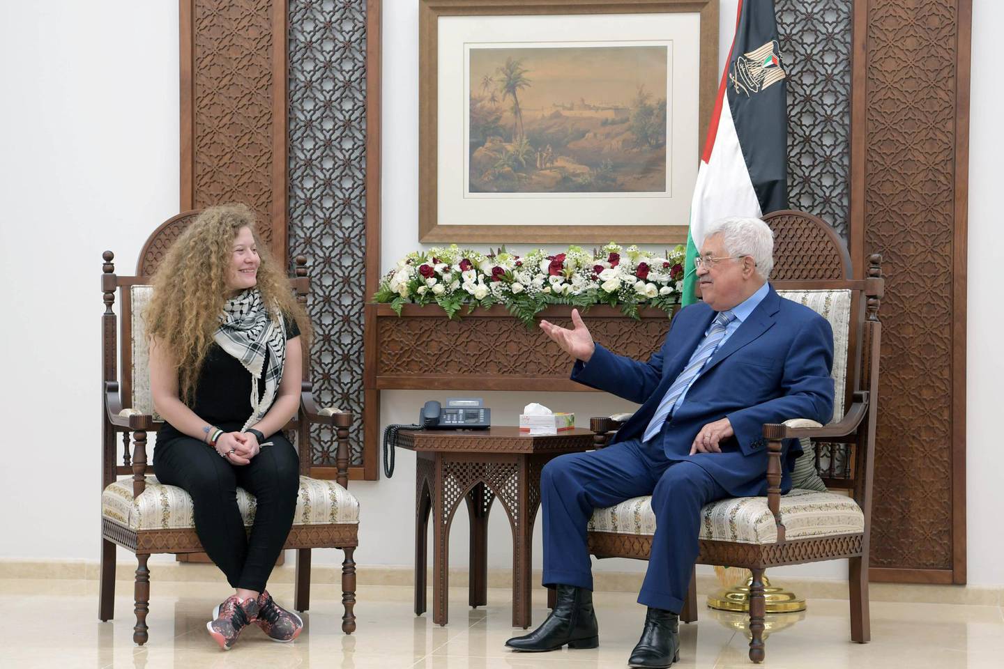 Palestinian President Mahmoud Abbas meets with Freed Palestinian teenager Ahed Tamimi after she was released from an Israeli prison, in Ramallah in the occupied West Bank July 29, 2018. PPO/Handout via REUTERS  ATTENTION EDITORS - THIS IMAGE HAS BEEN SUPPLIED BY A THIRD PARTY. NO RESALES. NO ARCHIVES.