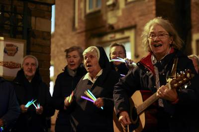 Nuns sing at the St Anthony's convent of Mercy Tunstall during the Clap for Heroes campaign in Sunderland. Reuters