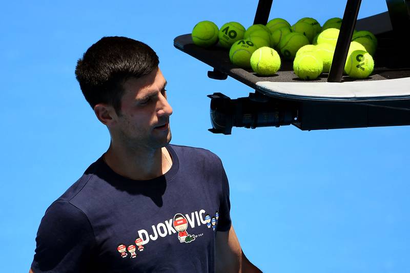 Novak Djokovic of Serbia takes a break during a practice session ahead of the Australian Open at the Melbourne Park tennis centre in Melbourne on January 12, 2022. AFP