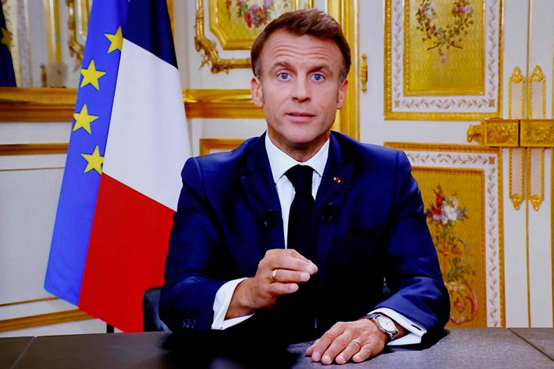 French President Emmanuel Macron speaks about the Israeli-Hamas conflict during a televised address to the nation on October 12, 2023. AFP