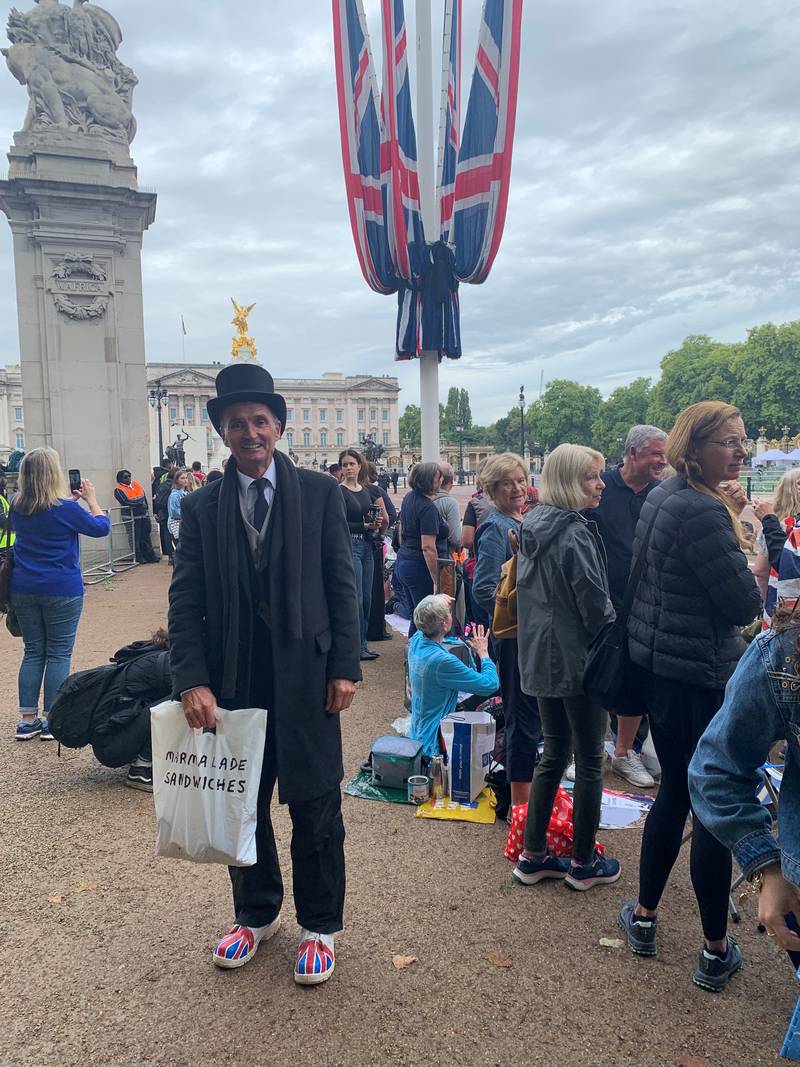 Royal fan 'Uncle Mick' on The Mall while waiting for the procession. The National