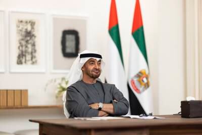 Sheikh Mohamed follows proceedings during the signing of the agreement. Photo: Ryan Carter / UAE Presidential Court 
