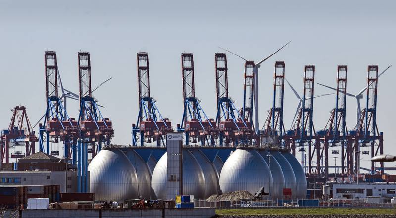 Tanks for producing biogas at the harbour in Hamburg, Germany, on April 19. AP