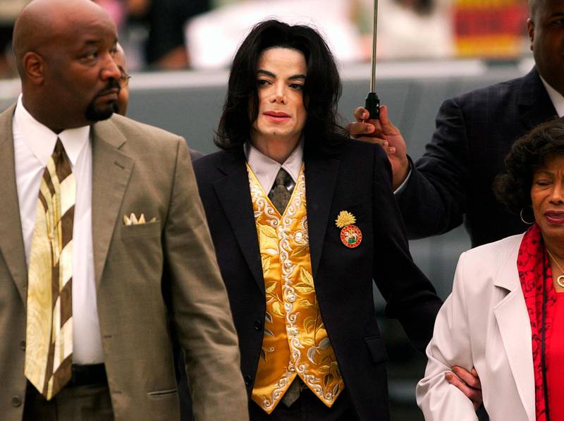 FILE - In this May 25, 2005 file photo, Michael Jackson arrives at the Santa Barbara County Courthouse for his child molestation trial in Santa Maria, Calif. A documentary film about two boys who accused Michael Jackson of sexual abuse is set to premiere at the Sundance Film Festival later this month. The Sundance Institute announced the addition of â€œLeaving Neverlandâ€ and â€œThe Brink,â€ a documentary about Steve Bannon, to its 2019 lineup on Wednesday. The Sundance Film Festival kicks off on Jan 24 and runs through Feb. 4. (Aaron Lambert/Santa Maria Times via AP, Pool)
