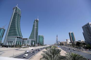 Bahrain's Financial Harbour, left, and World Trade Centre in Manama. The nation's parliament has approved a draft law for the implementation of VAT. Reuters