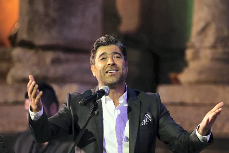 Lebanese singer Wael Kfoury  performs at the Jarash Festival of Culture and  Arts, on July 30, 2015 at the South Theatre of Jordan's ancient Greek-Roman city of Jarash  . AFP PHOTO/KHALIL MAZRAAWI (Photo by KHALIL MAZRAAWI / AFP)