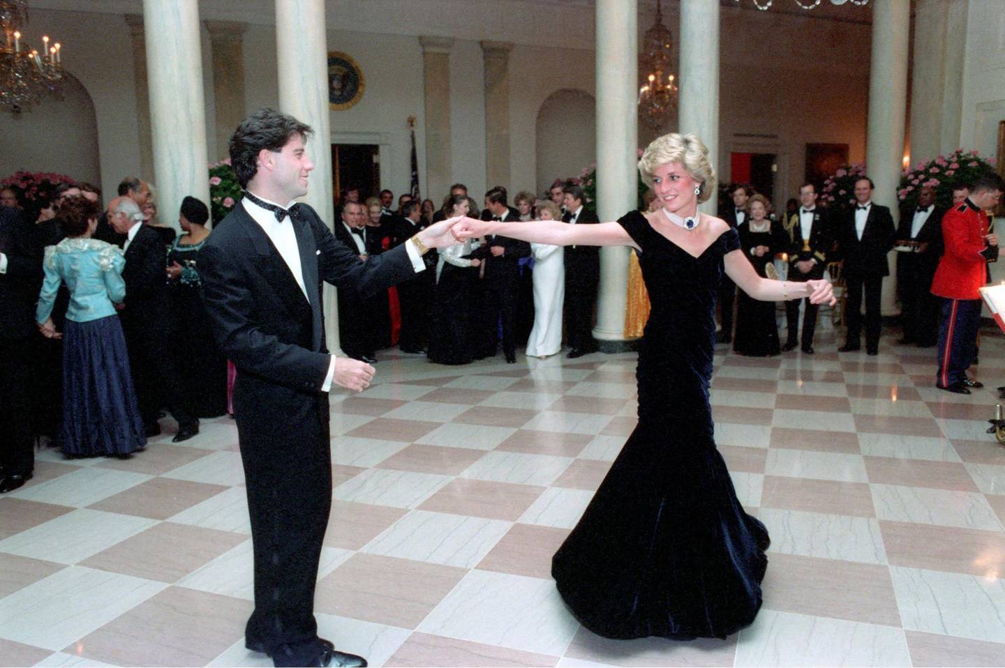 Mandatory Credit: Photo by REX/Shutterstock (2662657b)
Princess Diana dances with John Travolta
White House dinner, Washington DC, America - 09 Nov 1985
Previously unseen photos of Princess Diana dancing with a host of stars at a White House dinner in 1985 have emerged. At the event the late Princess famously showed off her dance moves with Saturday Night Fever king John Travolta. However, now new images reveal that the then 24-year-old royal also took to the dance floor with a number of other famous faces. This includes Clint Eastwood, Tom Selleck and United States President Ronald Reagan. For the dinner Diana wore a now famous Victor Edelstein gown, which sold earlier this year for £240,000.
