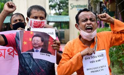 Men shout slogans and call for boycott of Chinese products during a demonstration in the north-eastern Indian city of Guwahati. AP Photo