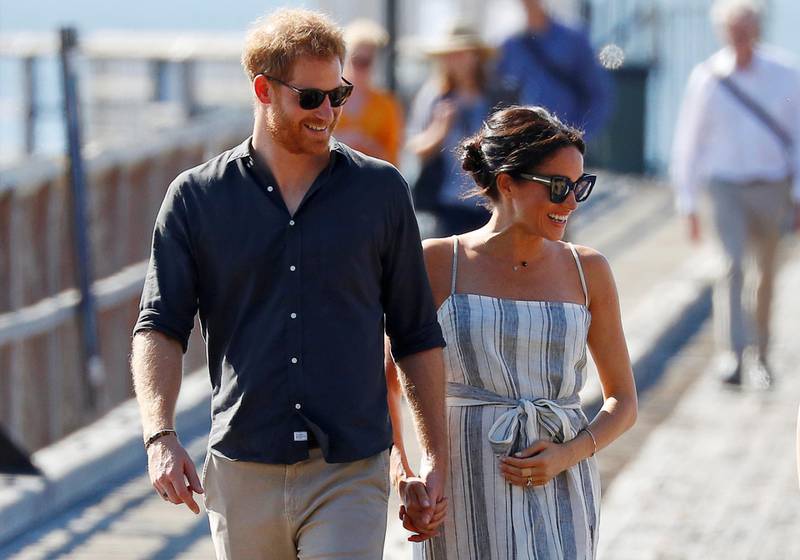 Britain's Prince Harry and Meghan, Duchess of Sussex, arrive to greet members of the public in Kingfisher Bay on Fraser Island in Queensland, Australia October 22, 2018. Reuters
