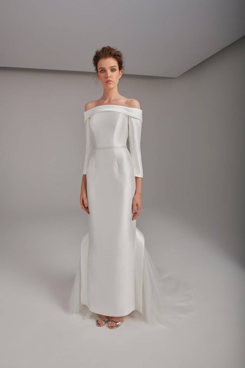 An understated, off-the-shoulder dress from the Rami Al Ali White collection. Courtesy Rami Al Ali