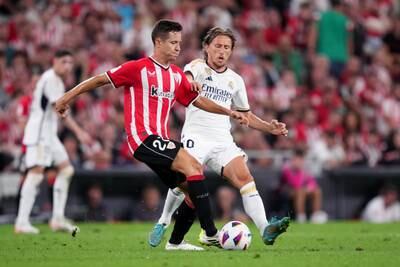 Ander Herrera battles for possession with Luka Modric of Real Madrid. Getty