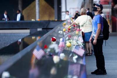 People visit the 9/11 memorial on the 20th anniversary of the September 11 attacks in Manhattan, New York. EPA