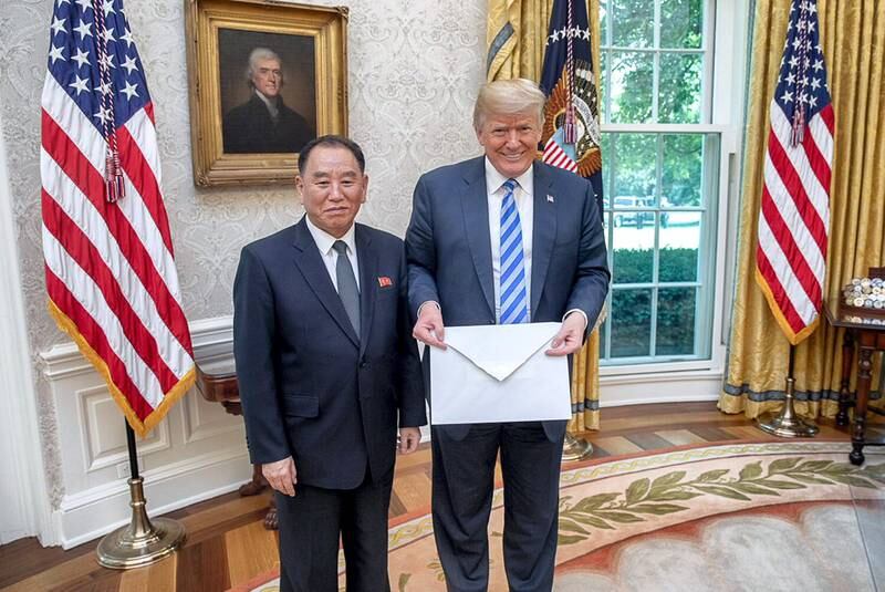 Former US president Donald Trump is presented with a letter from North Korean Leader Kim Jong-un in 2018 by North Korean envoy Kim Yong-chol in the Oval Office. Photo: White House