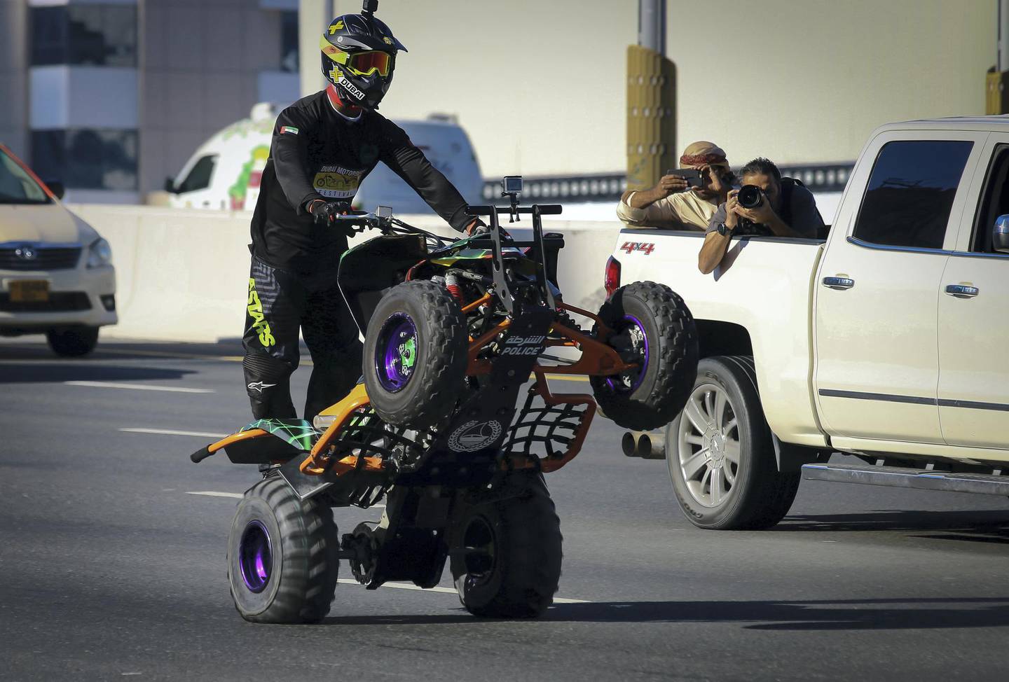 The Dubai Police and Dubai Motorbike Festival break the Guinness World Record for the World’s Longest Wheelie (Distance) on an ATV. Captain Abdulla Hattawi, a member of the Dubai Police Force, Dubai Police Stunt Team and one of the top ATV stunt athletes in the world has set the new record at an impressive 60km. Captain Abdulla Hattawi said, “I’m so proud to now be the Guinness World Record holder for the World’s Longest Wheelie on an ATV and to achieve another Guinness World Record for Dubai Police. It was an amazing experience and thank you to everyone who has supported us!” (Dubai Police handout) 