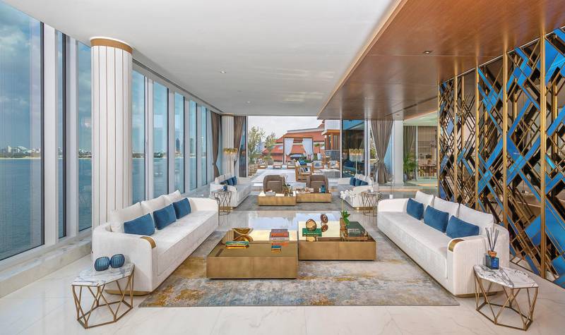 The living room at a penthouse on the Palm, designed by Hazel Wong - the architect behind Emirates Towers. Courtesy of Palma Holding