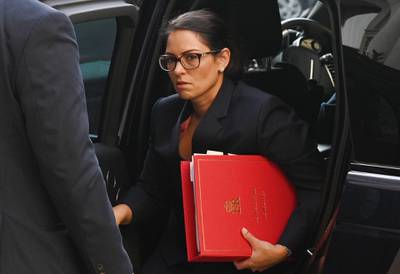 (FILES) In this file photo taken on September 22, 2020 Britain's Home Secretary Priti Patel arrives at the Foreign, Commonwealth and Development Office (FCDO) in central London on September 22, 2020 to attend the weekly meeting of the cabinet.  A Cabinet Office inquiry into allegations of bullying by Priti Patel has found evidence that she broke the ministerial code, informed sources said on November 20, 2020. / AFP / POOL / Leon Neal
