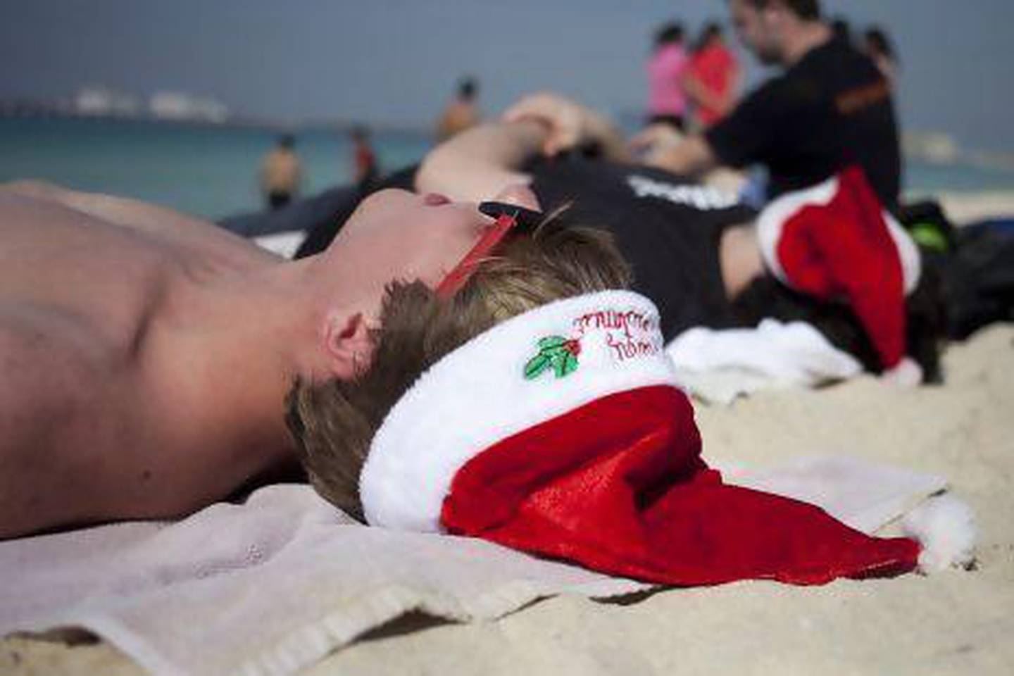 Nick Cifranic, 19, a student at the Rochester Institute of Technology, at JBR beach on Christmas day while on a study abroad programme from New York. Razan Alzayani / The National