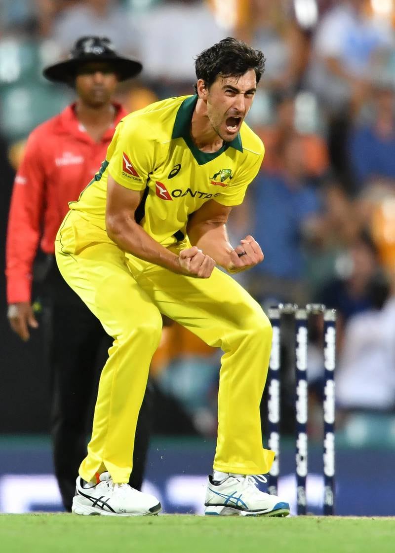 epa06453222 Mitchell Starc of Australia celebrates after getting the wicket of Moeen Ali of England during the second One Day International (ODI) cricket match between Australia and England at the Gabba in Brisbane, Queensland, Australia, 19 January 2018.  EPA/DARREN ENGLAND -- EDITORIAL USE ONLY, IMAGES TO BE USED FOR NEWS REPORTING PURPOSES ONLY, NO COMMERCIAL USE WHATSOEVER, NO USE IN BOOKS WITHOUT PRIOR WRITTEN CONSENT FROM AAP -- AUSTRALIA AND NEW ZEALAND OUT