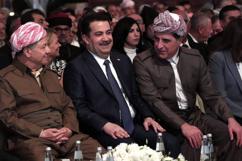 From left, Masoud Barzani, leader of the Kurdistan Democratic Party, and Iraqi Prime Minister Mohammed Shia Al Sudani sit with President of Iraqi Kurdistan Nechirvan Barzani. AFP