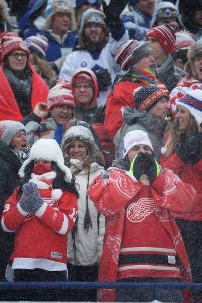 Detroit Red Wings fans cheer as their team takes the ice to play the Toronto Maple Leafs in the NHL Winter Classic on Wednesday at Michigan Stadium in Ann Arbor, Michigan. Jamie Sabau/Getty Images
