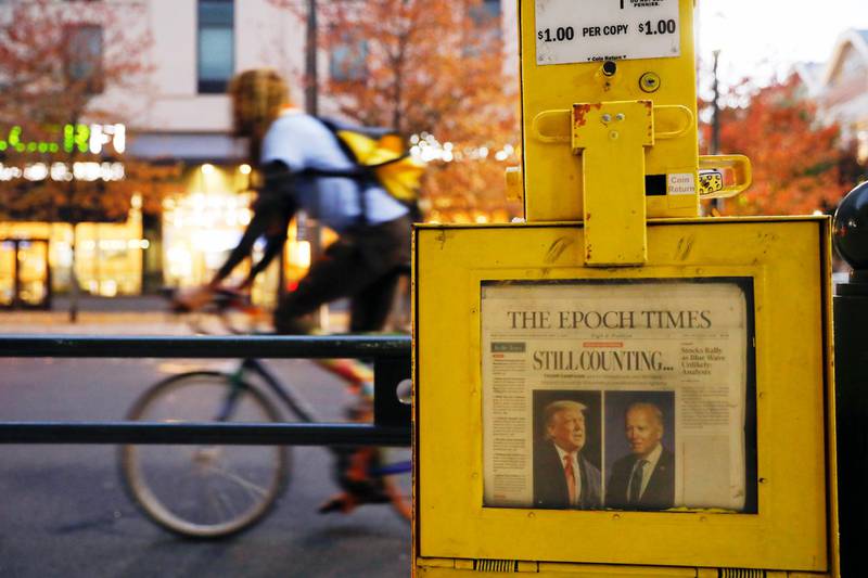 A newspaper from Thursday, Nov. 5 sits in a street box outside the Pennsylvania Convention Center in Philadelphia. AP Photo