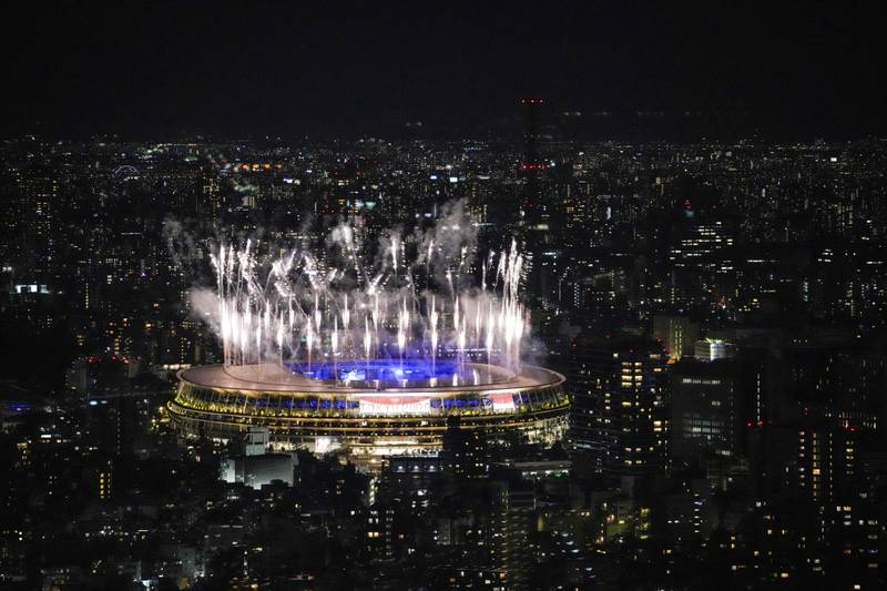 Fireworks illuminate over National Stadium during the closing ceremony of the Tokyo Olympics on Sunday, August  8, 2021.