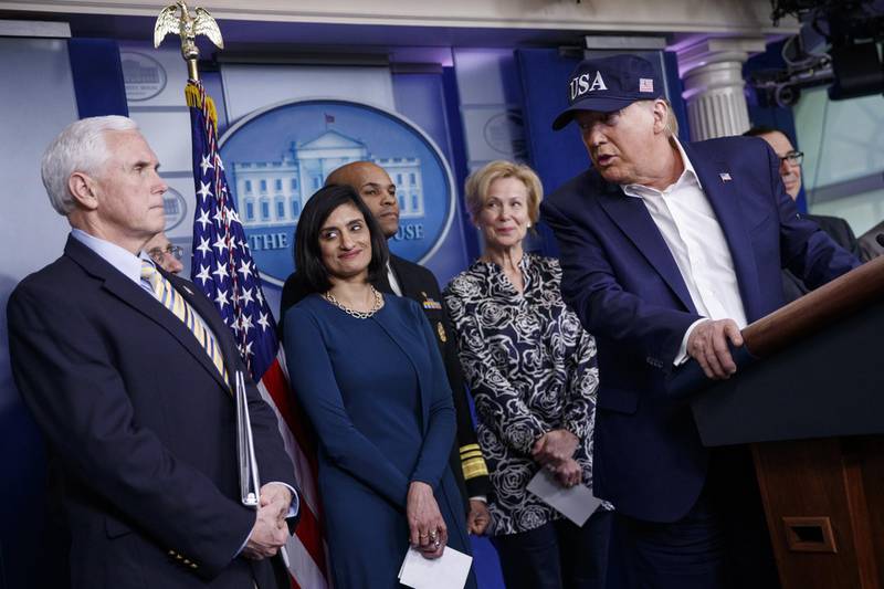 US President Donald Trump looks at US President Mike Pence while answering a question during a news conference in the briefing room of the White House. Bloomberg