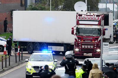 THURROCK, ENGLAND - OCTOBER 23: A lorry in which 39 bodies were discovered in the trailer is driven from the site to a secure location where further forensic investigation can take place, on October 23, 2019 in Thurrock, England. The lorry was discovered early Wednesday morning in Waterglade Industrial Park on Eastern Avenue in the town of Grays. Authorities said they believed the lorry originated in Bulgaria. (Photo by Leon Neal/Getty Images)