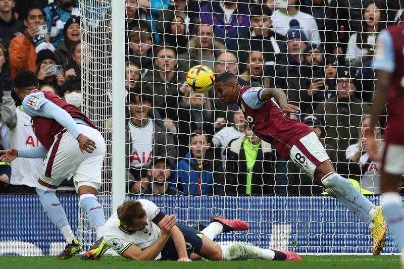 Aston Villa's Ashley Young heads the ball off the line to deny Harry Kane a first-half goal for Spurs. AFP