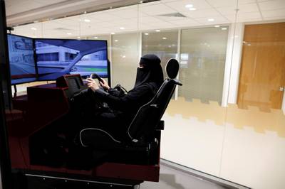 Trainee Amira Abdulgader practices on a simulator. Ahmed Jadallah / Reuters