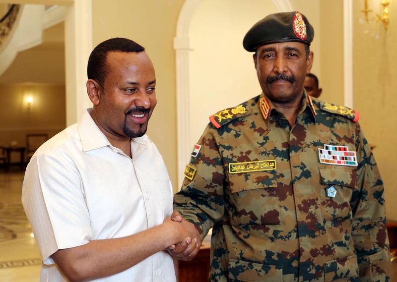 Mr Ahmed meets the head of Sudan's Transitional Military Council, Lieutenant General Abdel Fattah Al Burhan Abdelrahman, to mediate in the political crisis  in Sudan on June 7, 2019. Reuters